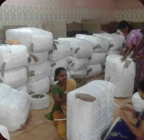 Staff baling hair for export