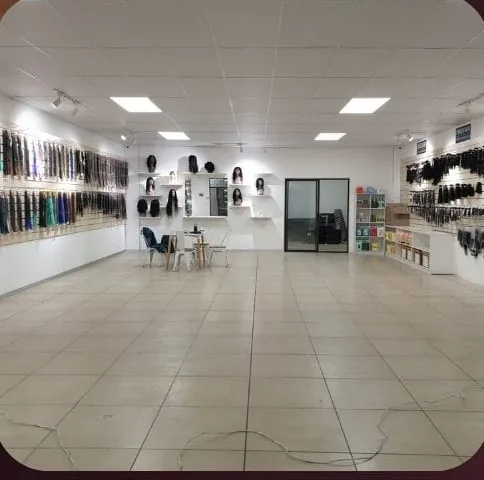 Ravi Group showroom with hair displays and wig heads